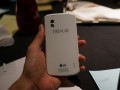 White Nexus 4 photos surface next to a nice cake