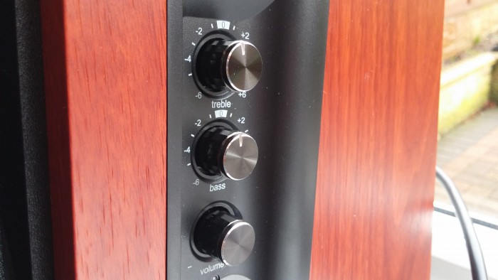 Just got these edifier r1700bt speakers. I love them but im confused on  what these 2 buttons do. All I know is they control something called sound  field extension. Anyone know? 