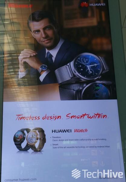 A Huawei Android Wear watch appears