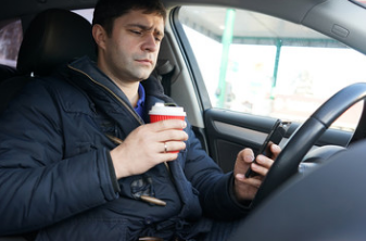 Driving and using the phone? Fines and points to double